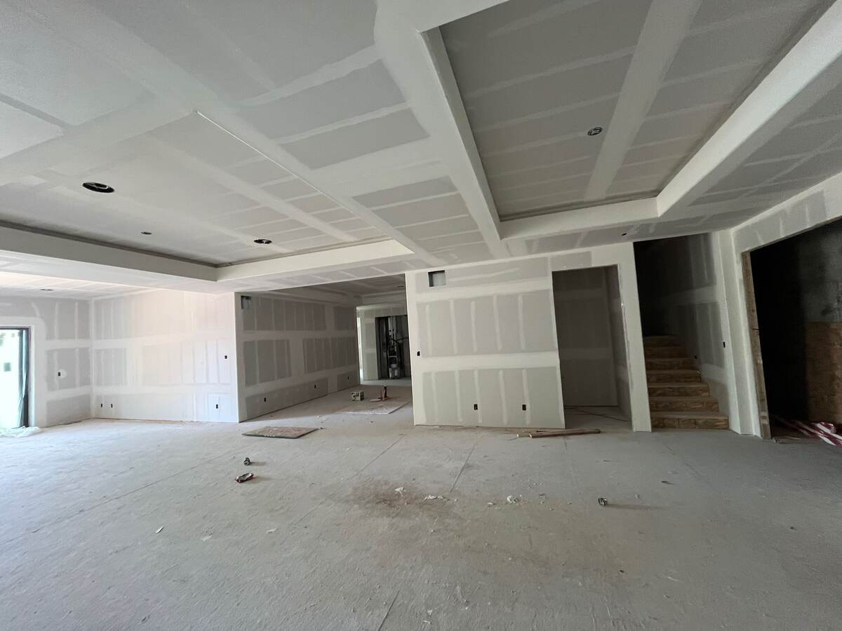 Strong Finish Drywall open plan home — tray ceiling drywall finish with staircase and open-concept layout, Denver Colorado